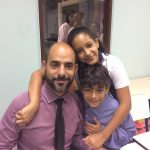 Pai e filho posam para foto na homenagem do Dia dos Pais, em agosto