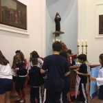 Celebração do 4º dia da Novena de Santa Rita, com alunos, pais, Irmãs Calvarianas e equipe pedagógica