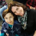 Famílias com trajes juninos posam para foto na Festa Junina 2019
