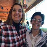 Famílias com trajes juninos posam para foto na Festa Junina 2019