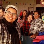 Famílias com trajes juninos posam para foto na Festa Junina 2019
