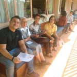 Participantes reunidos às mesas no encontro da Festa de Nossa Senhora do Calvário