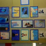 Estande com os trabalhos dos alunos na exposição da Semana Cultural