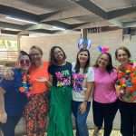 Educadoras fantasiadas durante o Carnaval no Coração