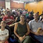Pais e famílias reunidos no auditório do colégio durante a 1ª Reunião de Pais de 2026